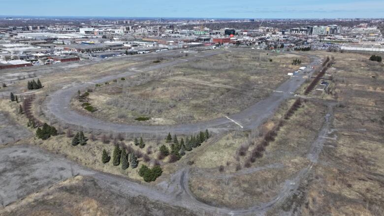 The site of an empty field from above.