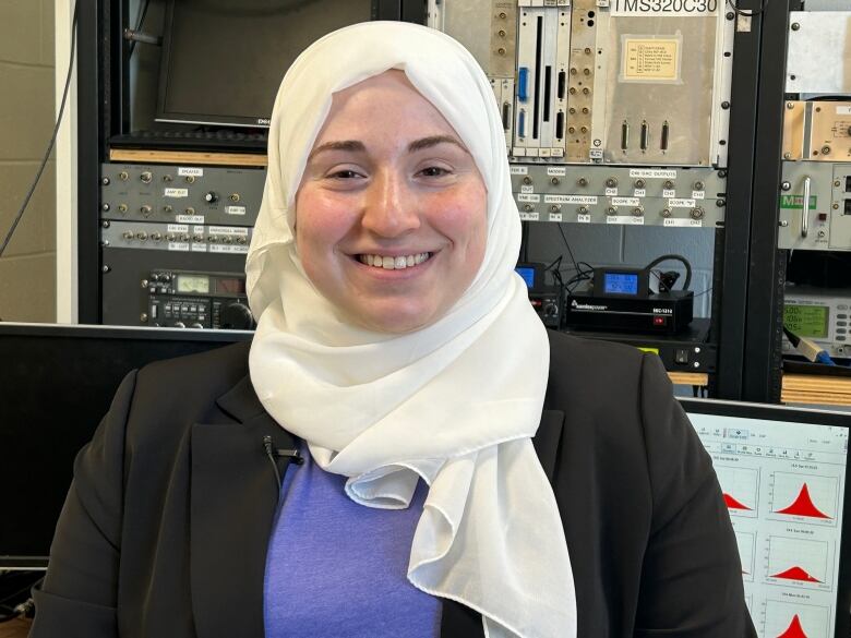 A white lady wearing a white hijab.