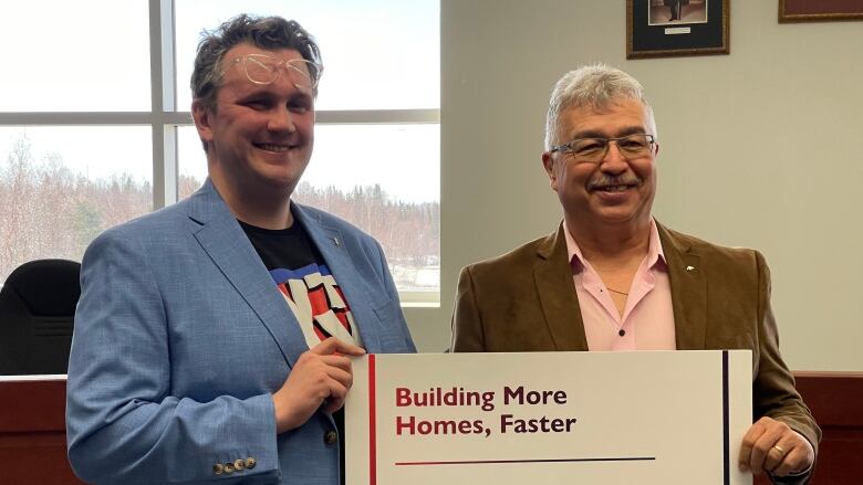 Yellowknife Deputy Mayor Garett Cochrane (left) made the announcement with MP Michael McLeod at Yellowknife City Hall Monday.