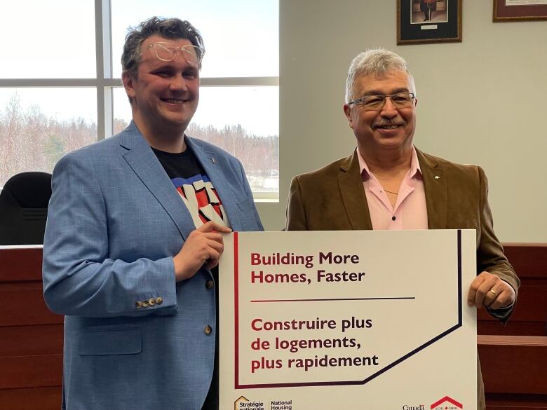 Yellowknife Deputy Mayor Garett Cochrane (left) made the announcement with MP Michael McLeod at Yellowknife City Hall.