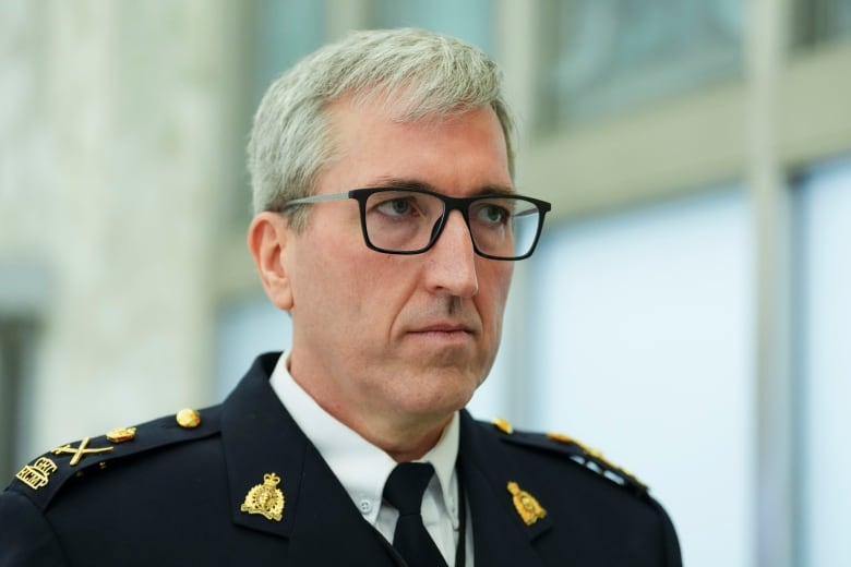 RCMP Deputy Commissioner Mark Flynn arrives to appear as a witness at the Public Inquiry Into Foreign Interference in Federal Electoral Processes and Democratic Institutions in Ottawa on Thursday, April 4, 2024.