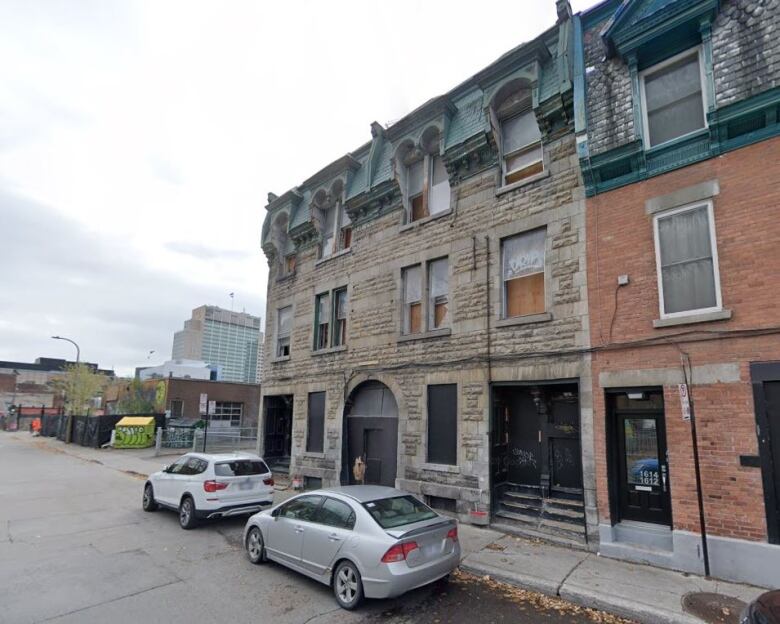 image of a boarded up building