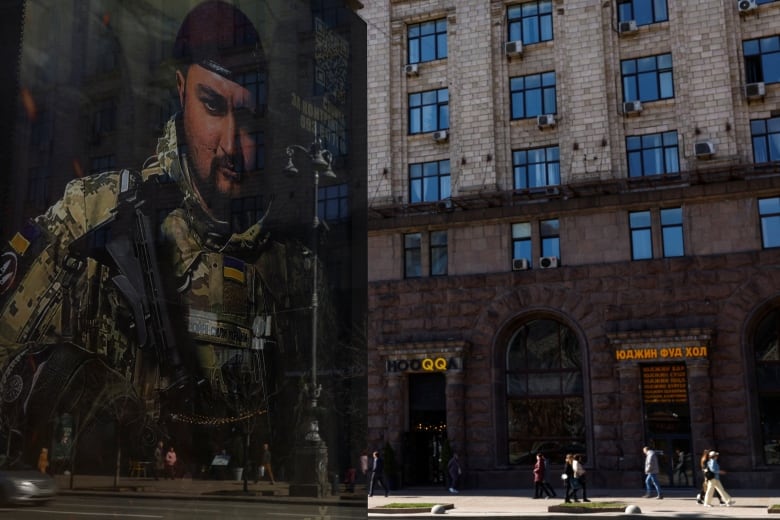 A banner advertising contract military service is seen on display in central Kyiv.