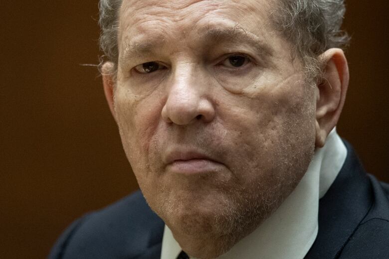 A close up of a man in court.