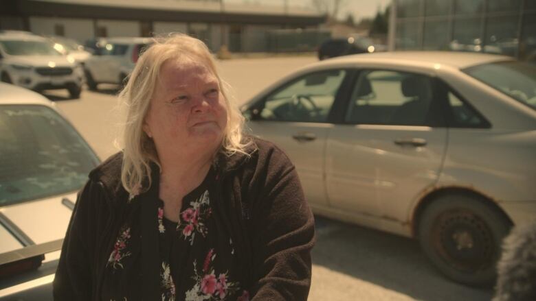 Leslie Clayton-Winget standing in the parking lot at Canadian Tire in Statford. 