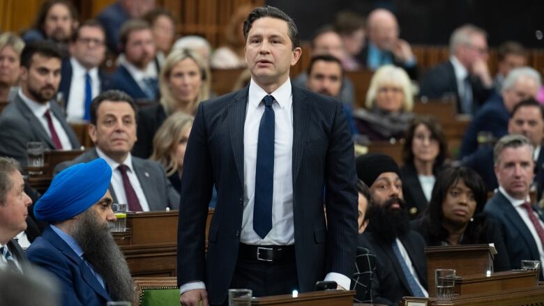 Leader of the Conservative Party Pierre Poilievre rises in response to the Speaker asking him to withdraw language during Question Period, Tuesday, April 30, 2024 in Ottawa. 