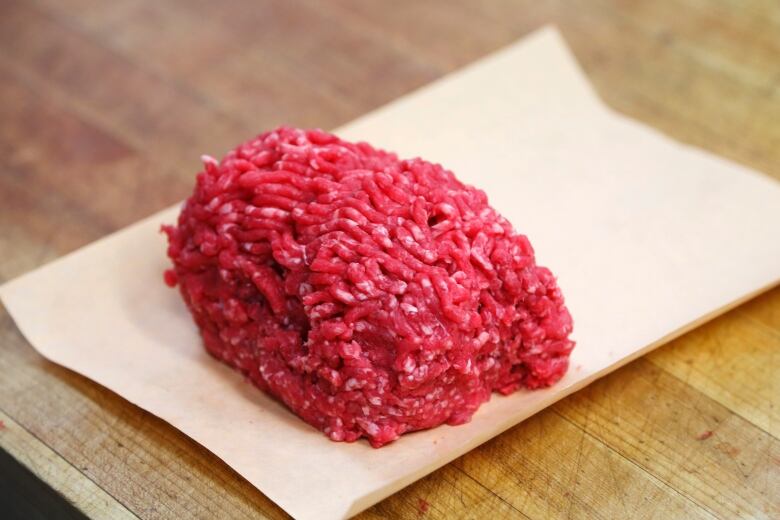 Ground Alberta beef is seen before packaging at Bon Ton Meat Market in Calgary, Alberta, October 3, 2012. Bon Ton stated it was not effected by the recent E.Coli outbreak as they get their meat from select smaller producers. E. coli, a strain of which can cause sickness or even death, is widely present in meat-processing plants, and regulators require packers to co