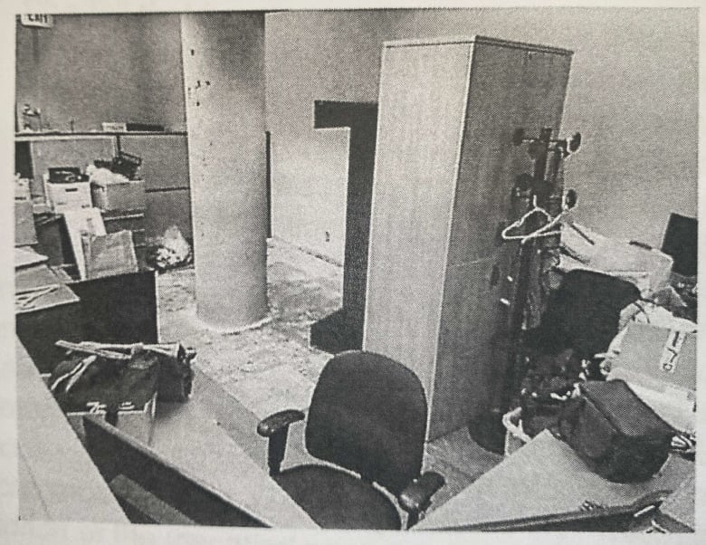 A photograph included in an investigative report detailing allegations of RCMP bullying against Surrey Police Service officers shows the cluttered area where a municipal officer claims they were forced to work.