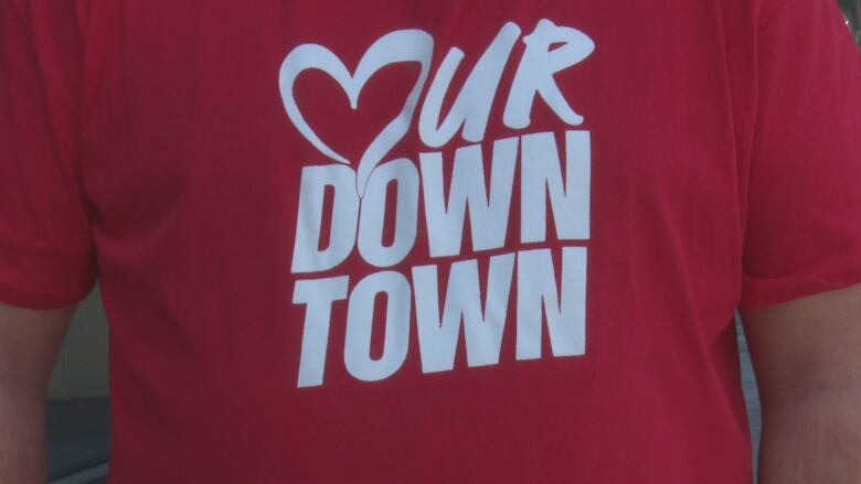 A red promotional T-shirt.