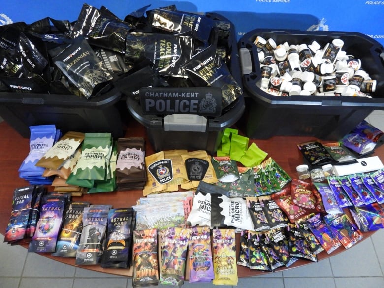 A display of mushroom products wrapped in plastic