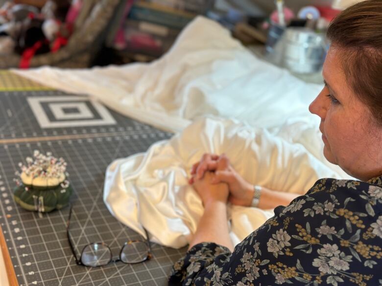 Woman at sewing table