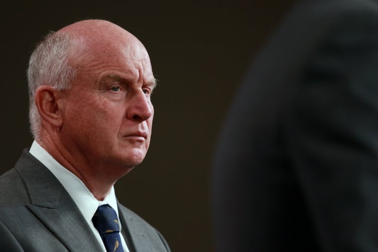 Minister of Public Safety and Solicitor General Mike Farnworth attends a press conference in the press theatre at legislature in Victoria, B.C., on Thursday, October 5, 2023.