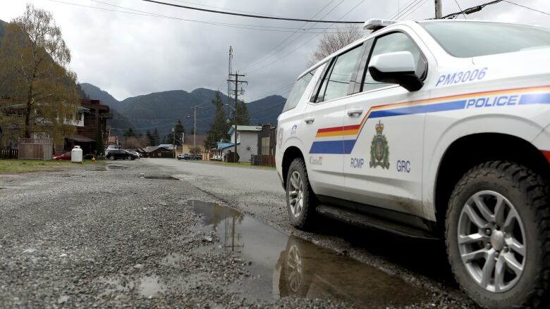 An RCMP officer makes their rounds in the village of Zeballos, B.C., on Wednesday, April 10, 2024.