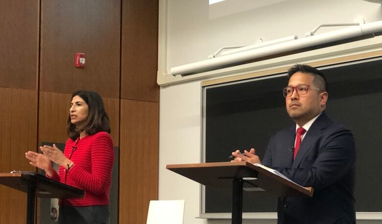 Mississauga mayoral candidates Dipika Damerla, left, and Alvin Tedjo, right, are pictured here at a debate on housing on Monday.