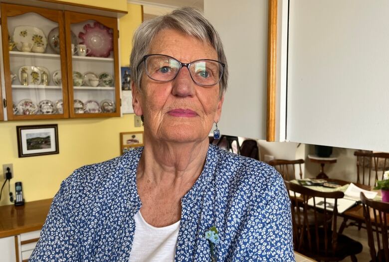 a portrait style photo of an older woman.