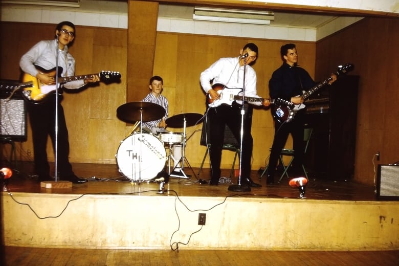 A band plays on a stage