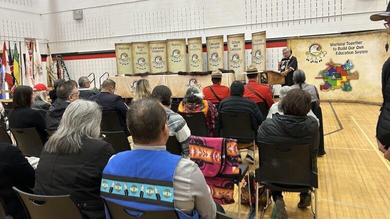 People listening at the grand opening of East Central First Nations Education Partnership  held on Thurday at Bernard Constant Community School in James Smith Cree Nation