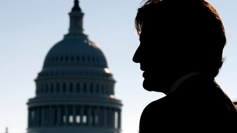 Silhouette of Trudeau in front of the Capitol dome