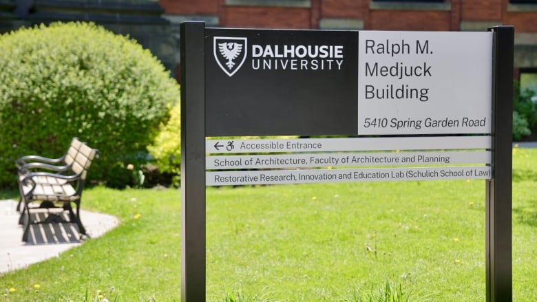 Sign out front of building that says Dalhousie University Ralph M. Medjuck Building.