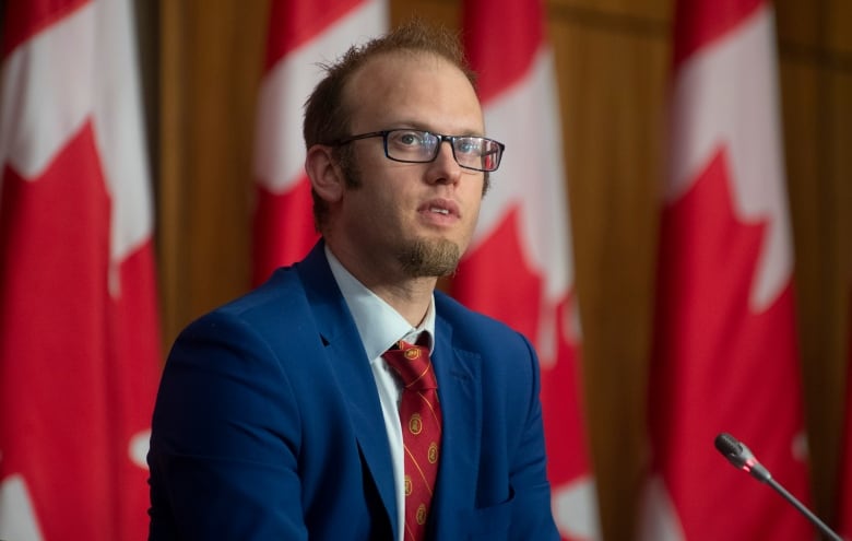 Conservative MP Arnold Viersen listens to a speaker during a news conference,  Thursday, May 27, 2021 in Ottawa.