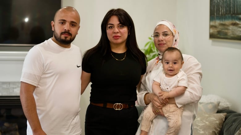 Abeer Abusharar (center) spent months trying to get her brother Oun, his wife Haneen and their son Sanad out of Gaza through Canada's special visa program from extended family. They landed in Montreal on May 6 after evacuating Gaza by paying a $15,000 bribe.