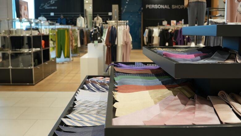 A colourful assortment of neckties are seen on display in a department store.