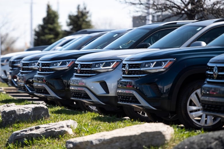 A row of the front end of SUVs