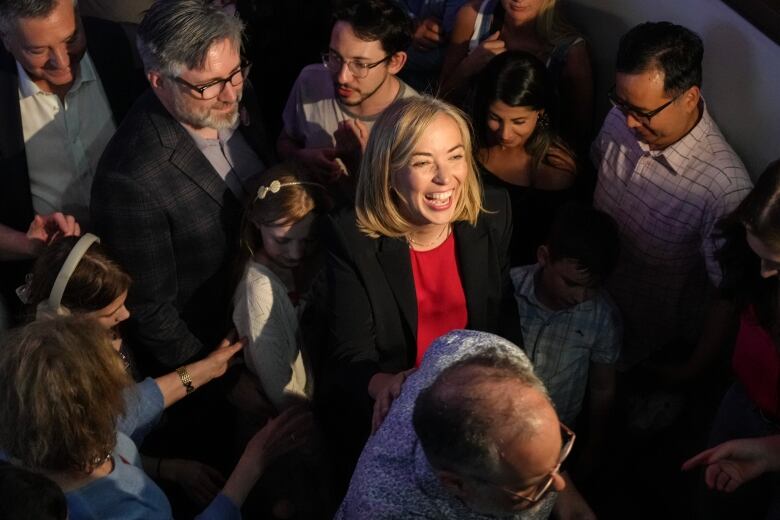 Liberal Party candidate Leslie Church greets supporters as the count continues for the Toronto-St.Paul's Federal Byelection, at an election night event in Toronto, on Monday, June 24, 2024.