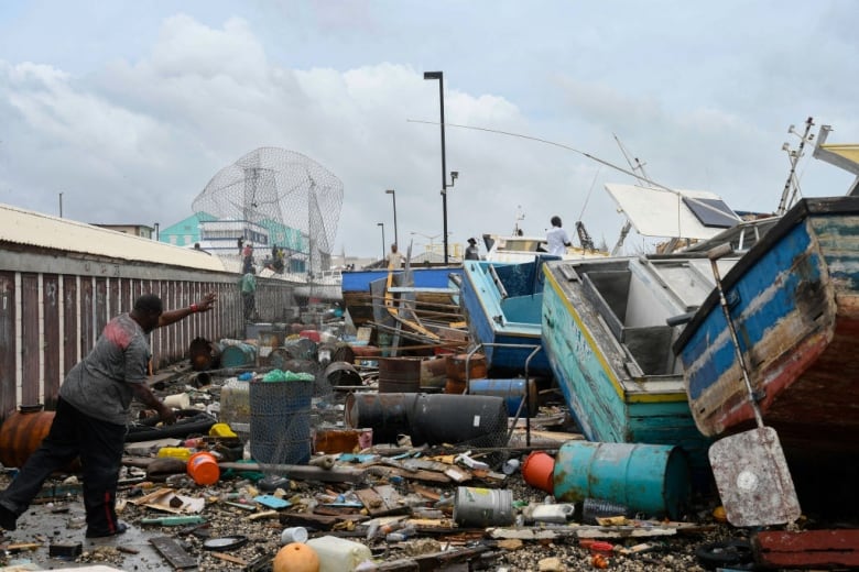 Fishing boats are arranged in a pile.