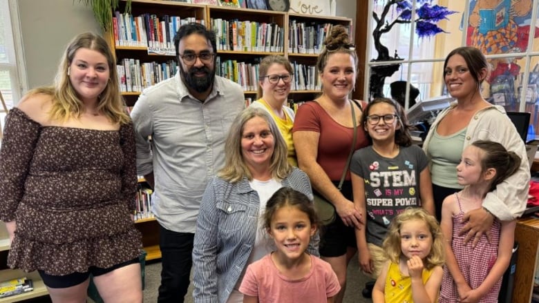 Group of readers smiles at camera