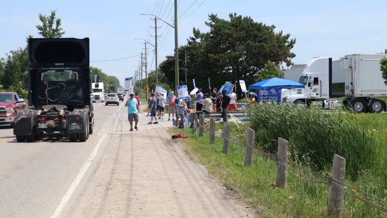 LCBO employees could be seen picketing in front of various storefronts Monday, however the largest presence, pictured here, was in front of the LCBO logistics facility on Wilton Grove Road.