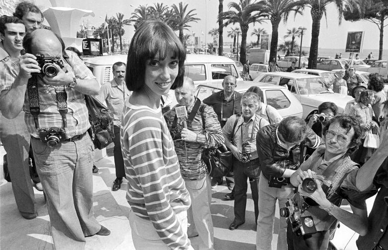  Shelley Duvall poses for photographers at the 30th Cannes Film Festival in France, May 27, 1977. Duvall, whose wide-eyed, winsome presence was a mainstay in the films of Robert Altman and who co-starred in Stanley Kubrick's The Shining, has died. She was 75.