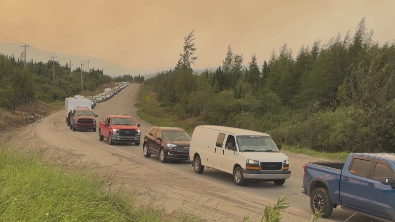 Cars bumper to bumper on a single lane highway