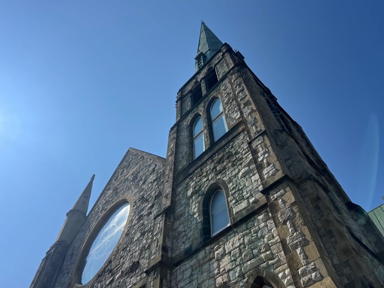 A church's stone exterior and spire.