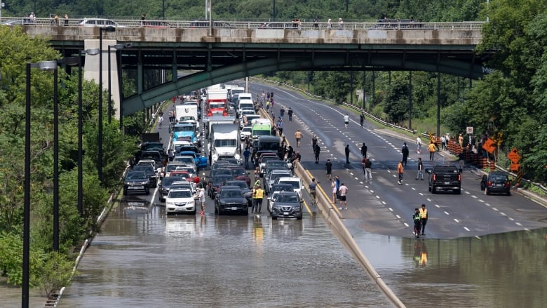 Drivers are stranded due to flood waters blocking the Don Valley Parkway.