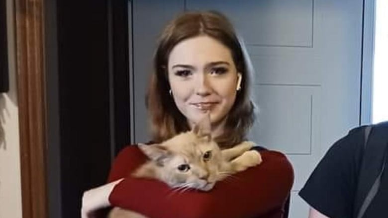 Breanna Broadfoot and her family's cat, Stitch, in an undated photo.