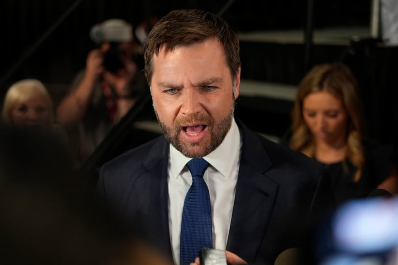 U.S. Senator J.D. Vance is seen speaking to reporters in Atlanta last month.