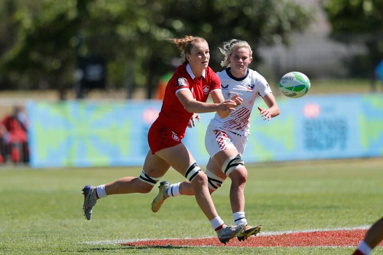 Carissa Norsten makes a pass on day one of the HSBC SVNS at Cape Town Stadium on December 9, 2023 in Cape Town, South Africa. 