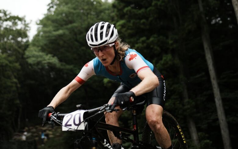 A woman mountain biking