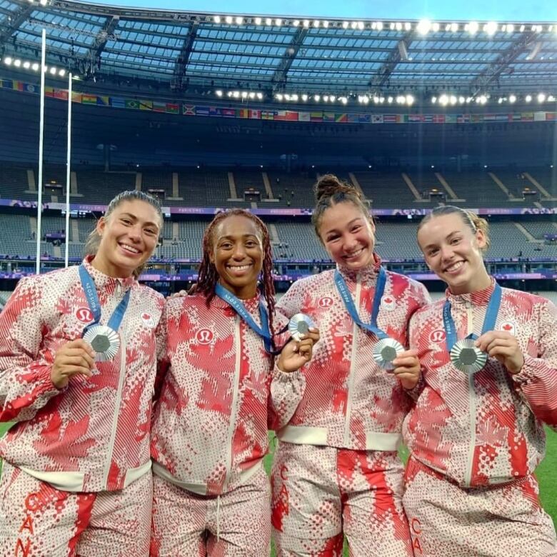 Team Canada show off their silver medals