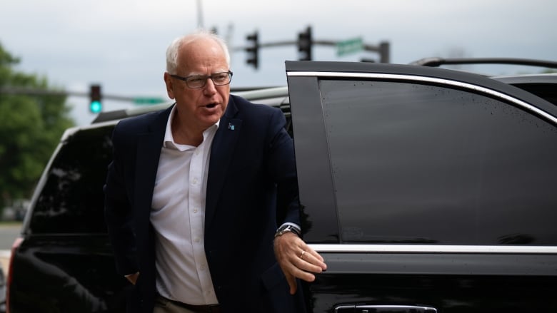 Minnesota Gov. Tim Walz is seen arriving at a press conference in Bloomington, Minn.,  last week.