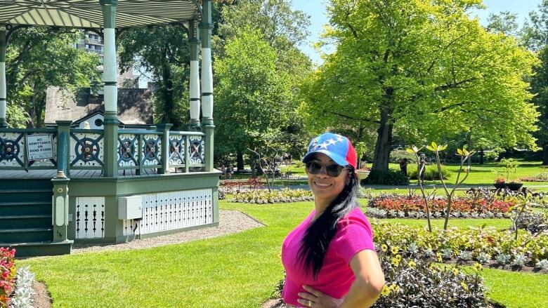 woman posing in public garden