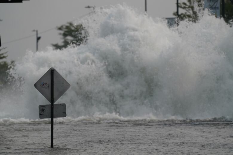 Wall of water with traffic sign