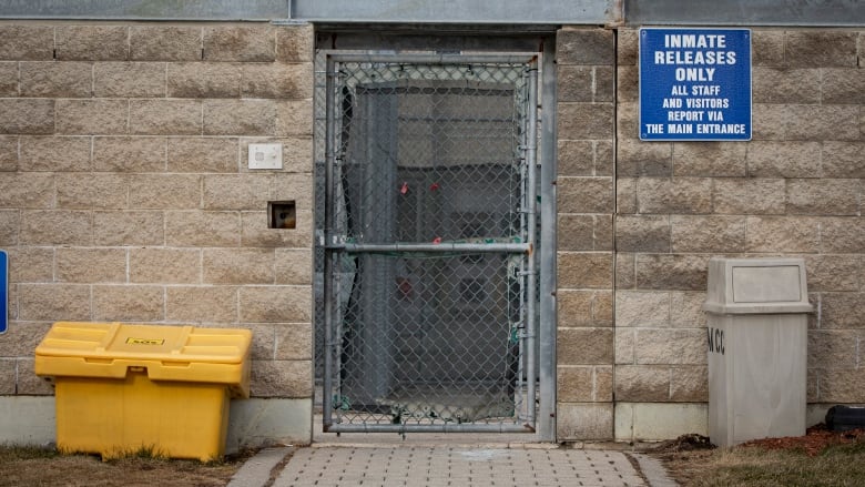 A doorway with a sign marked 