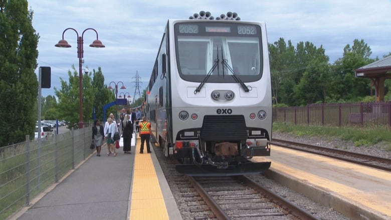 A commuter train at a train station