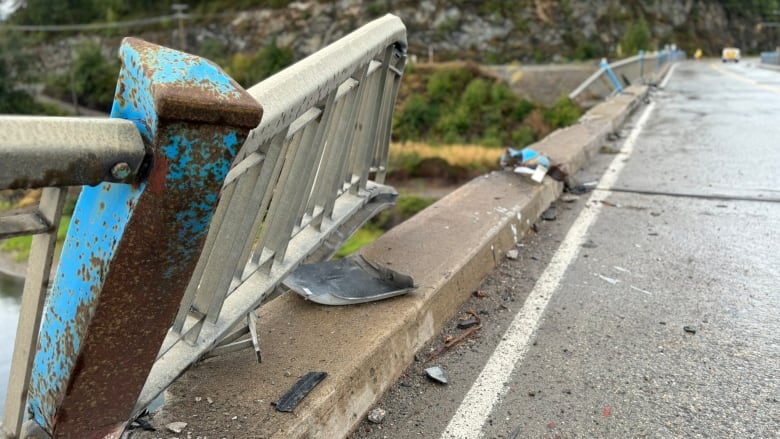 Damaged railing on a bridge