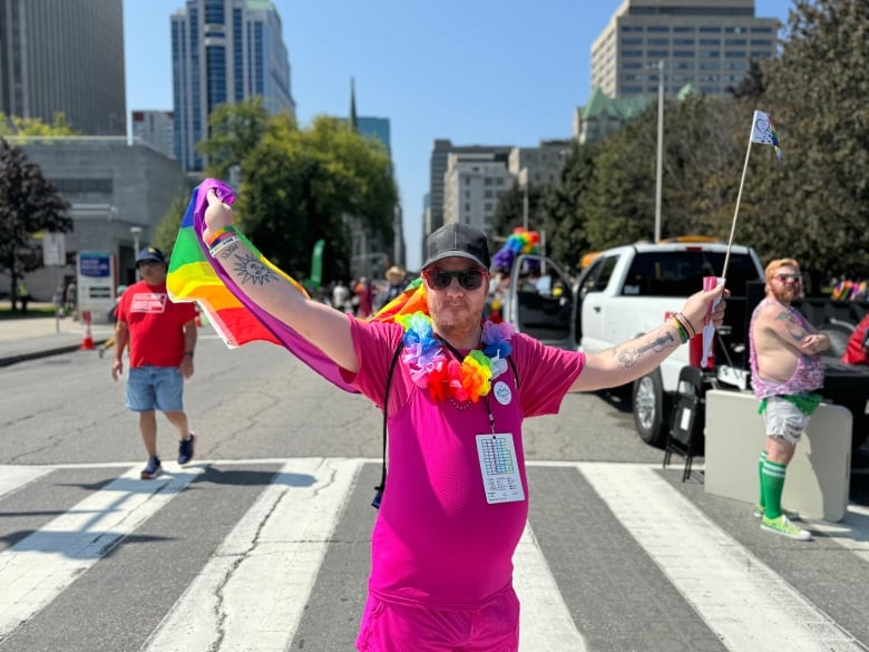 Person walking the Capital Pride Parade Aug. 25, 2024.