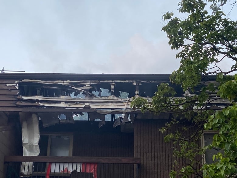 A fire-damaged building roof.