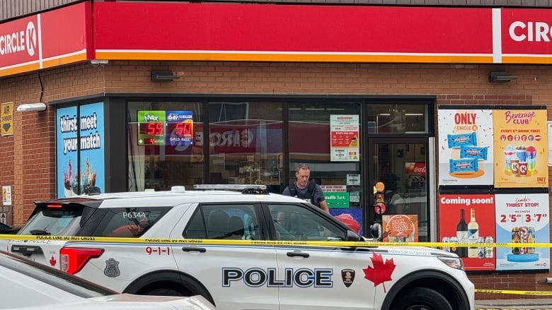 A Windsor police officer attends the scene of a drug bust in East Windsor where another officer sustained minor injuries.