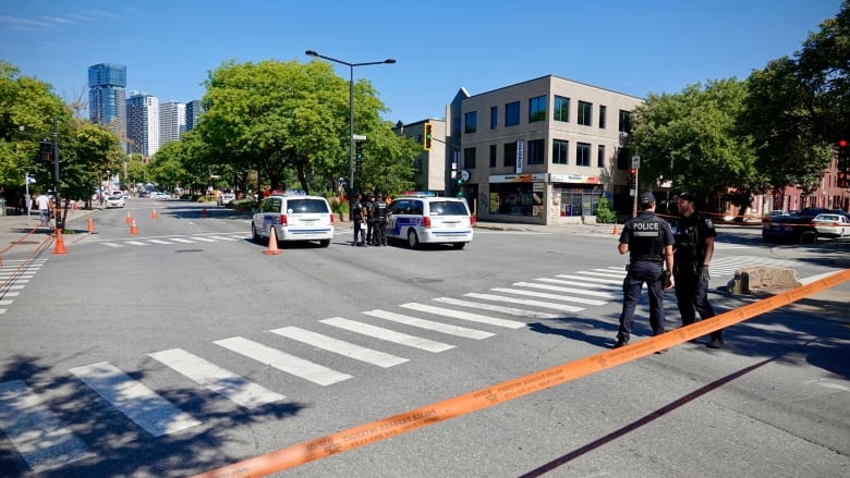 police cars and crime scene tape